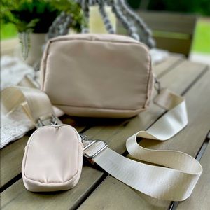 Cross body bag with small accessory pouch